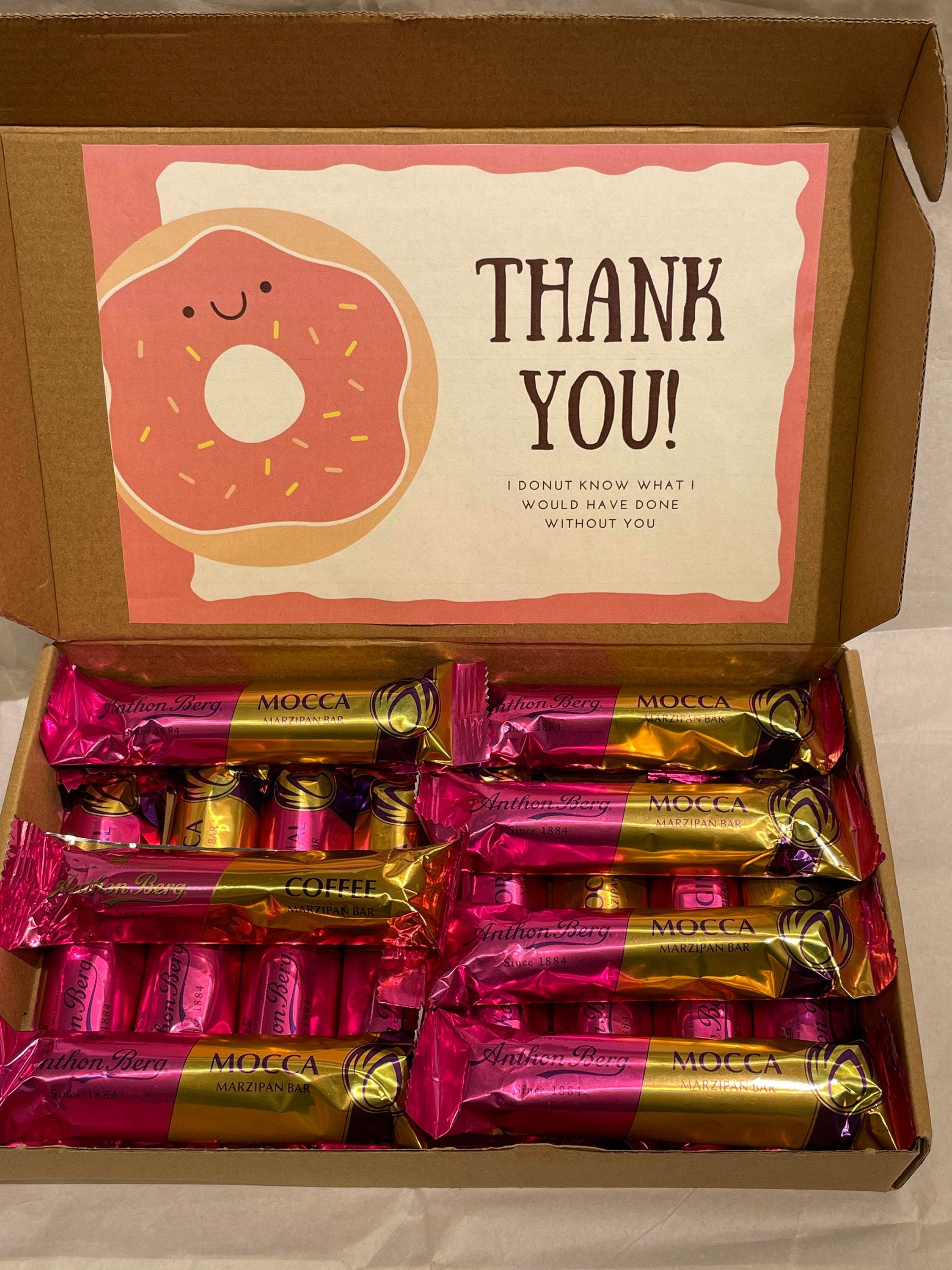 Open Anthon Berg marzipan gift box heavy size with fifteen 40g dark chocolate-covered marzipan bars and personalized greeting card