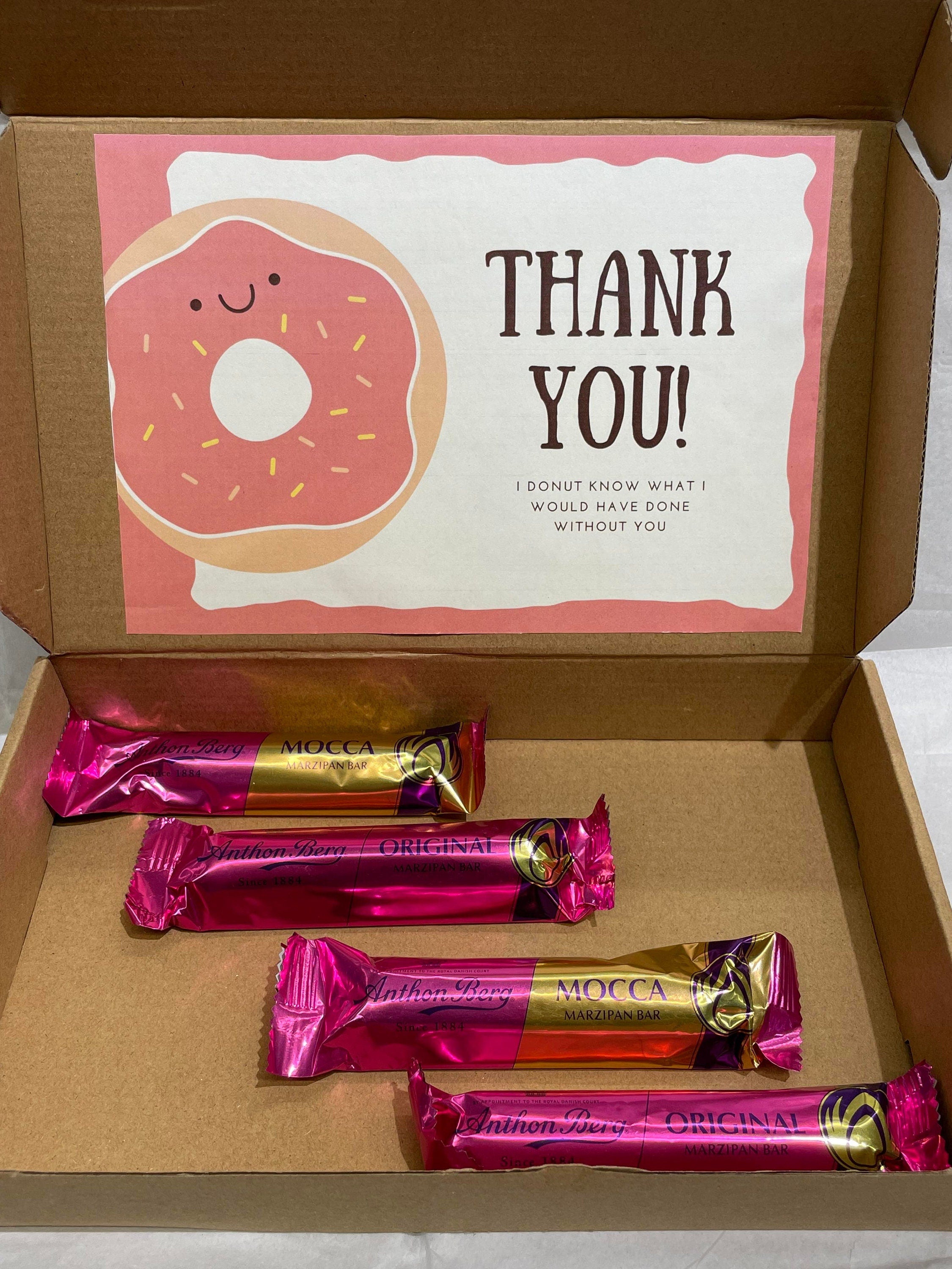 Open Anthon Berg marzipan gift box light size with four 40g dark chocolate-covered marzipan bars and personalized greeting card