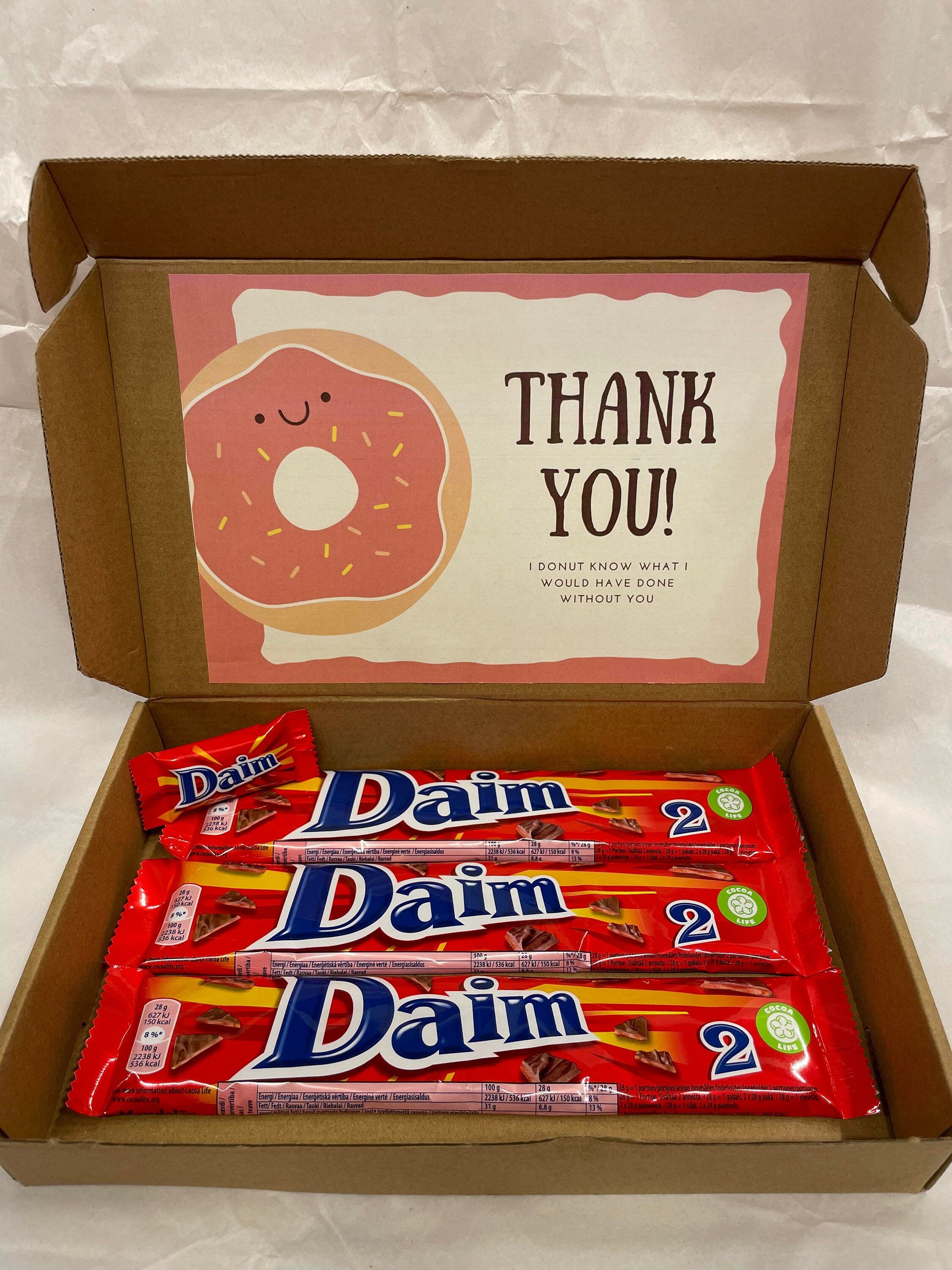 Open Daim chocolate gift box light size with three 56g double bars and one 6.5g mini bar and personalized greeting card
