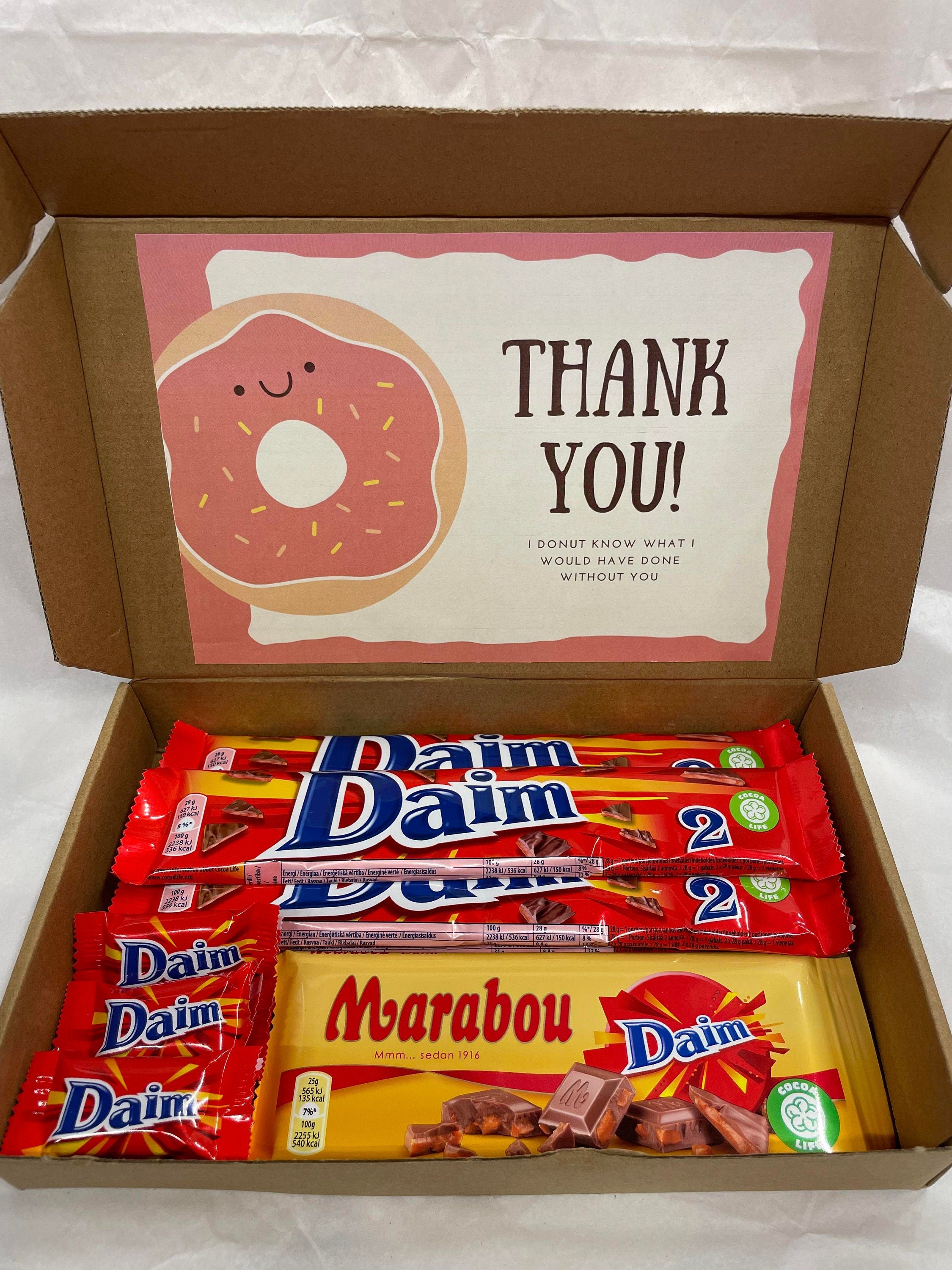 Open Daim chocolate gift box medium size with seven 56g double bars and six 6.5g mini bars and personalized greeting card