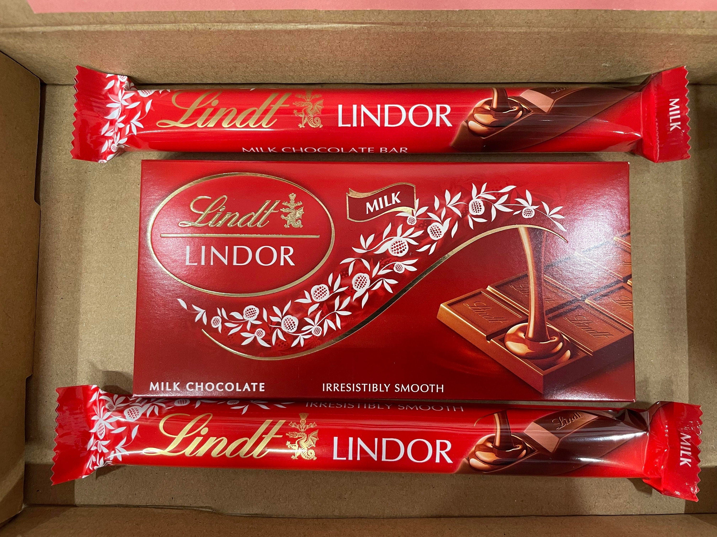 Lindt Lindor milk chocolate gift box light size containing two 40g sticks and one 100g bar