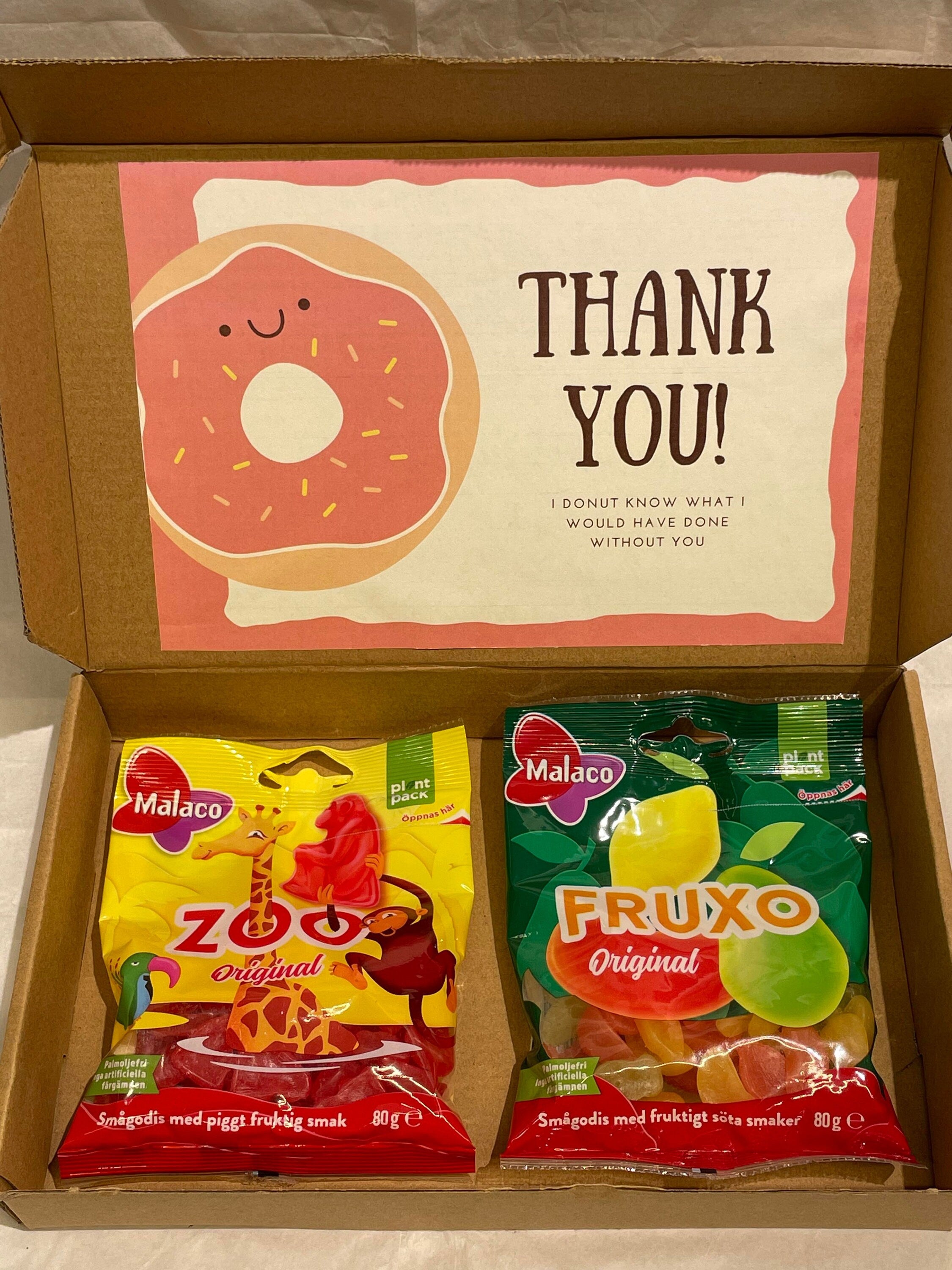Open Malaco candy gift box light size with one 80g Zoo gummy bag and one 80g Fruxo fruit gummy bag and personalized greeting card
